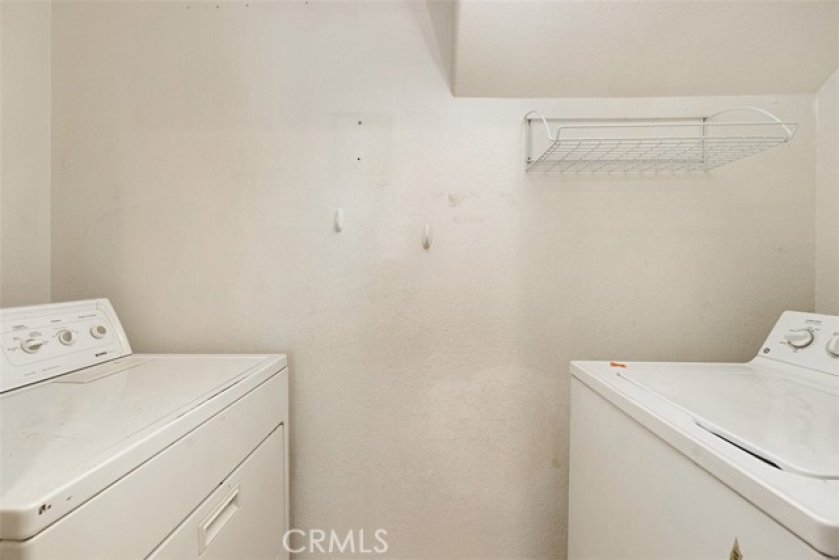 Plenty of space in the laundry room for full-sized washer and dryer.