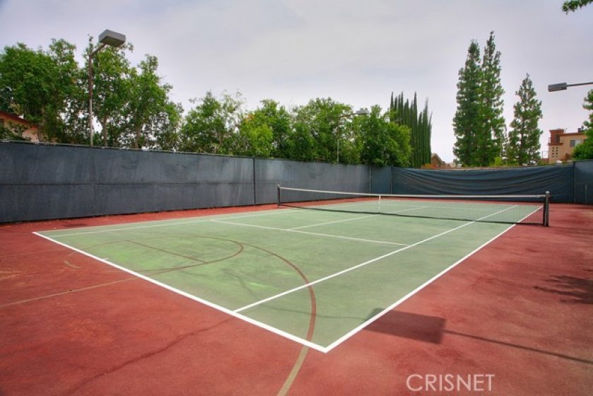 You are going to spend countless hours enjoying the sparkling community pool and lighted tennis court.