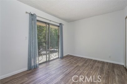 Spectacular Woodlake Villas Condominium Located at 991 S Idaho Street #102 was Just Sold