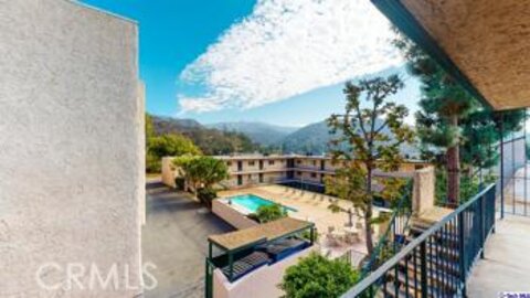 Charming Verdugo Penthouse Condominium Located at 2940 N Verdugo Road #404 was Just Sold