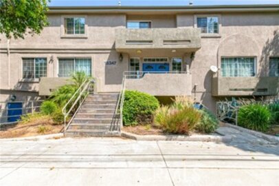 This Delightful Landmark Townhomes Townhouse, Located at 18347 Saticoy Street #17, is Back on the Market