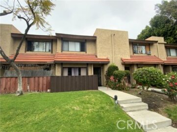 Elegant Plummer Gardens Townhouse Located at 14435 Plummer Street #7 was Just Sold