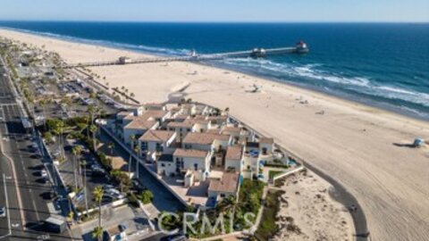 Delightful Newly Listed Huntington Pacific Condominium Located at 711 Pacific Coast #410