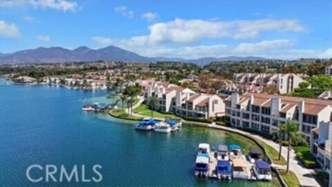 This Splendid Finisterra on the Lake Condominium, Located at 27805 Barbate #15, is Back on the Market