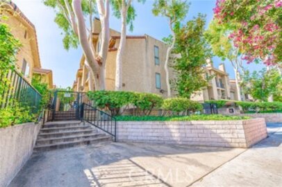 Charming Sherman Plaza Townhouse Located at 18954 Sherman Way #8 was Just Sold