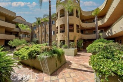 Spectacular Newly Listed Toscana Court Condominium Located at 12841 Bloomfield Street #103