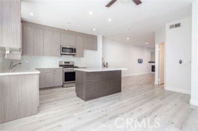 Outstanding Newly Listed Landmark Townhomes Townhouse Located at 18347 Saticoy #28