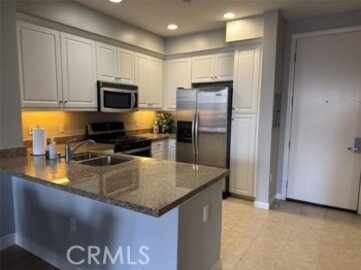 Impressive Newly Listed Lotus Walk Condominium Located at 12842 Palm Street #108