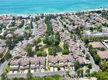 This Extraordinary Old Mill Pond Townhouse, Located at 26972 Mill Pond Road #30, is Back on the Market