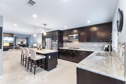 This Impressive Pacific Ranch Townhomes Townhouse, Located at 19451 Pompano #107, is Back on the Market