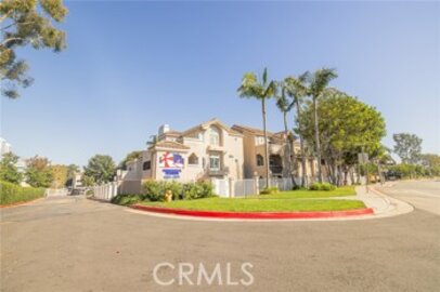 This Delightful Seaport I Condominium, Located at 4561 Warner Avenue #101, is Back on the Market