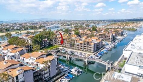 This Charming Marina Pacifica Condominium, Located at 7124 N Marina Pacifica, is Back on the Market