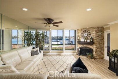 This Charming Finisterra on the Lake Condominium, Located at 27805 Barbate #15, is Back on the Market