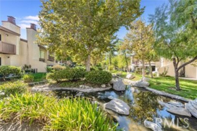 Elegant Newly Listed Warner Woodlands Two Townhouse Located at 21551 Burbank Boulevard #76