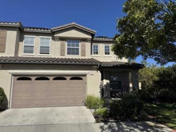 Elegant Poinsettia Heights Townhouse Located at 6454 Kinglet Way was Just Sold