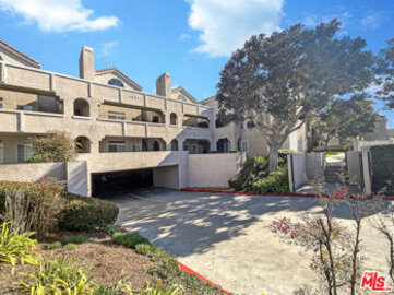 Marvelous Seaport I Condominium Located at 4561 Warner Avenue #202 was Just Sold