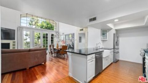 Magnificent Century Villa Condominium Located at 10327 Missouri Avenue #301 was Just Sold