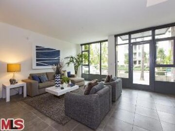 Terrific Concerto Lofts Condominium Located at 13045 Pacific Promenade #121 was Just Sold