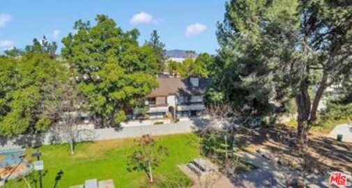 Lovely Woodman VIII Townhouse Located at 9600 Van Nuys Boulevard #102 was Just Sold