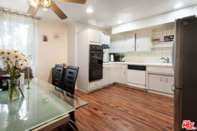 This Outstanding 4610 Densmore Ave Condominium, Located at 4610 Densmore Avenue #10, is Back on the Market