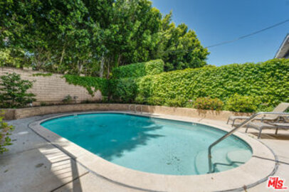 Elegant Dickens Court Condominiums Condominium Located at 15150 Dickens Street #203 was Just Sold