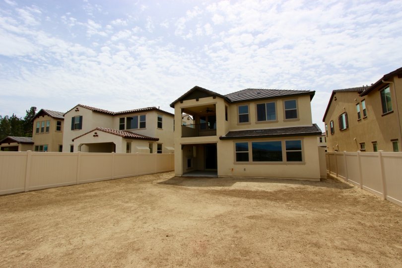 A backyard of a home being built in The Vineyard by Van Daele