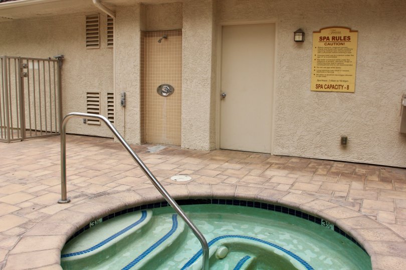 The water in a green spa is still in the community area at Triana at Corona Ranch.