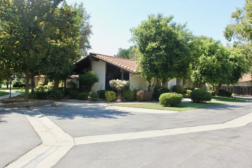 A secluded parking space among bungalows in Seven Hills community.