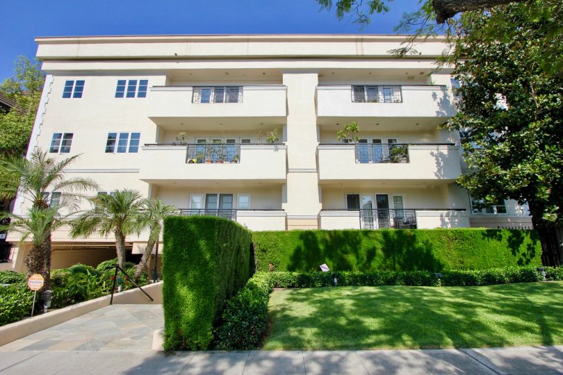 Well mowed lawn and green space of Palm Drive Plaza apartment, Beverly Hills, California