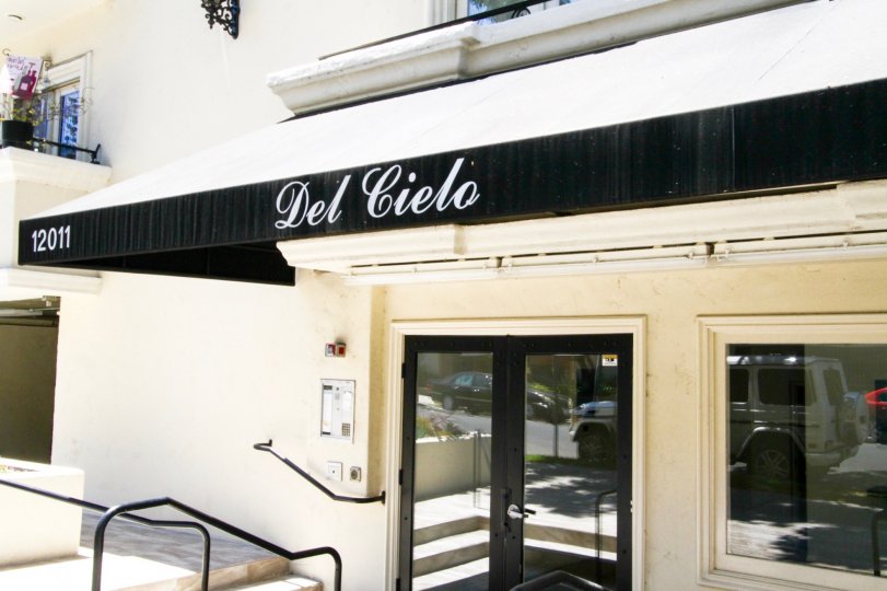 Marquee on awning at entrance to Del Cielo
