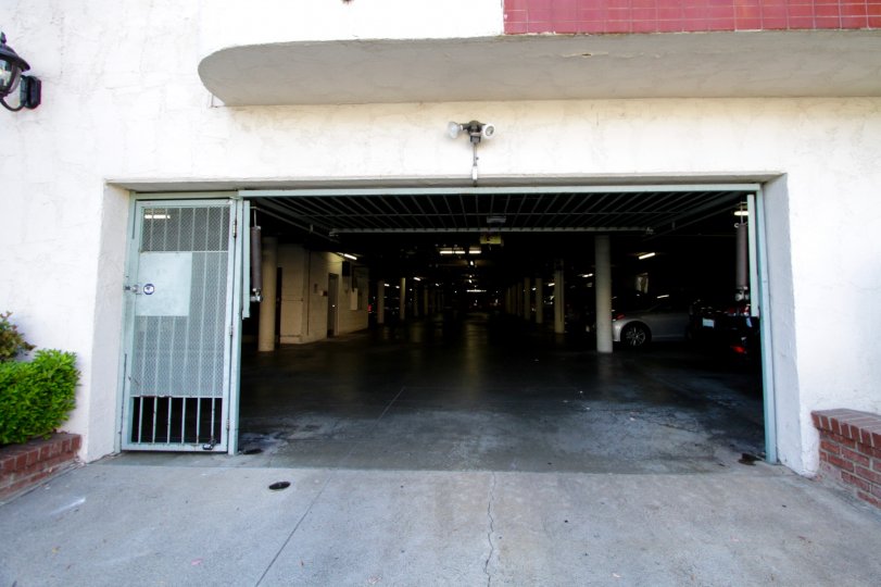 Gated parking garage entrance to Villa Florenze condos