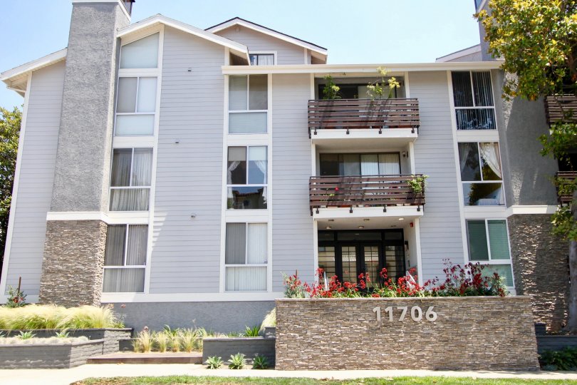 villa with 3 floors by 11706 number on it in Brentwood Cedar Tree