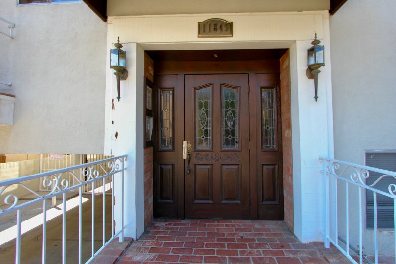 A View of the Front Door of Manor House Home in Brentwood