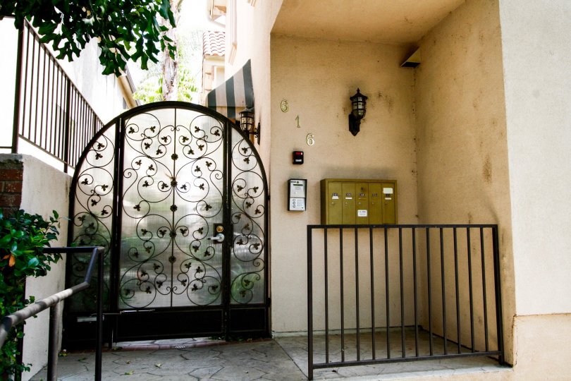 The gate into 616 E San Jose Ave