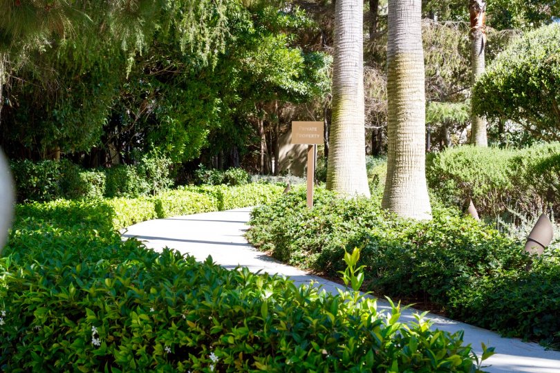 Lushly landscaped walkways full of jasmine surround The Century