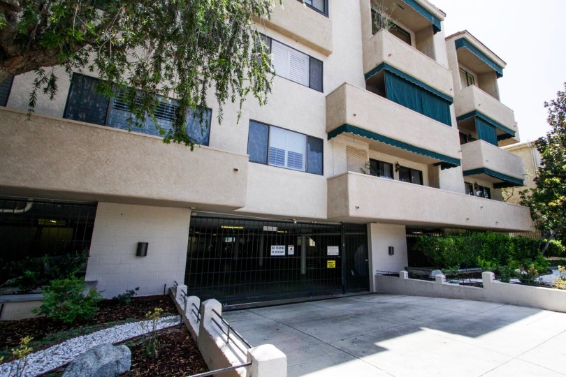 The gated entrance into the parking at Encino Racquet Club