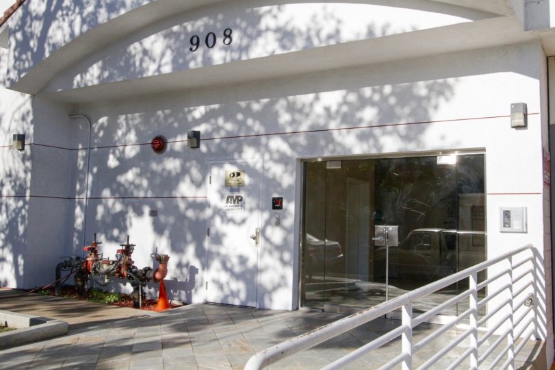 Double glass doors lead to the entrance of Lamk Villa condos