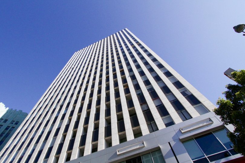 The Mercury building is a series of white columns ascending towards the sky