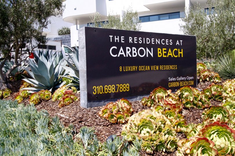 The sign annoucning Residences at Carbon Beach in CA California
