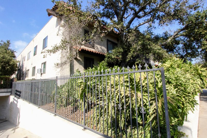 The fence around the property at 2473 Oswego St