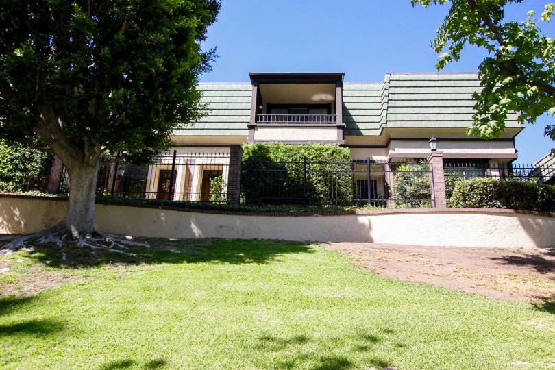 The yard in front of 85 S Orange Grove Blvd