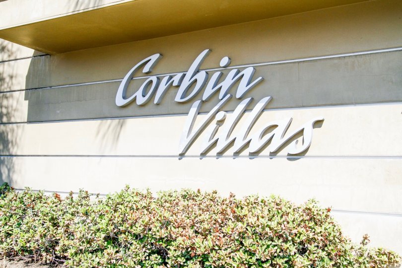 The landscaping around the Corbin Villas name