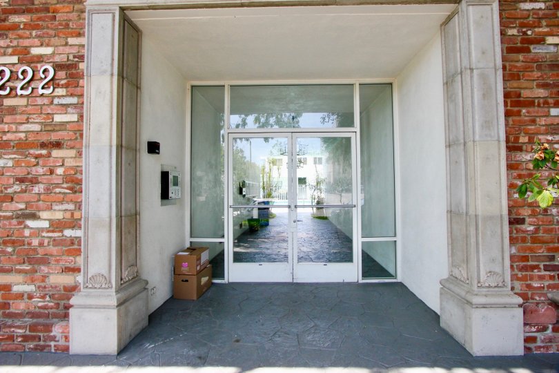 The white color glass front entrance of Princeton South