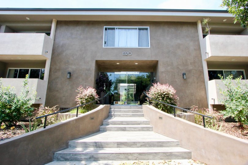 A clear day in the Princeton Villa with an entrance of a building.