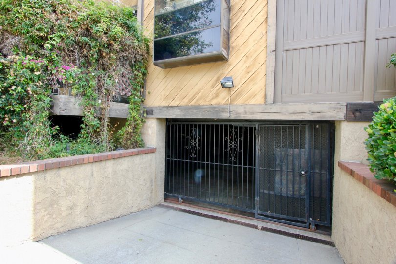 Entry of a big home in santa monica with gray sliding gate