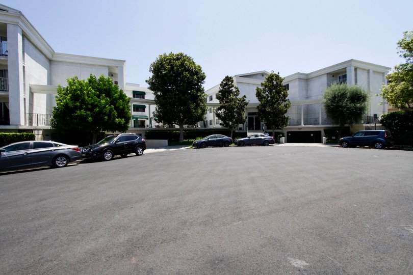 The curb alongside Golden Colonial Condominiums