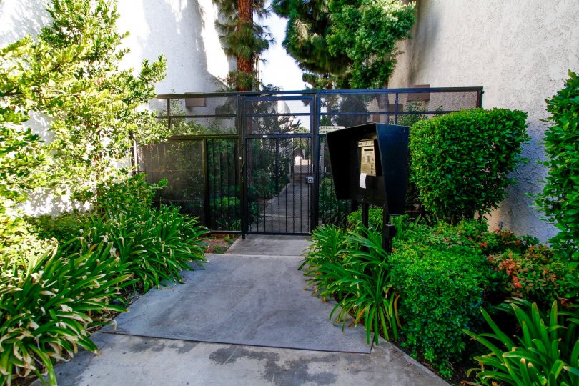The sidewalk up to Tarzana Villas South in CA California