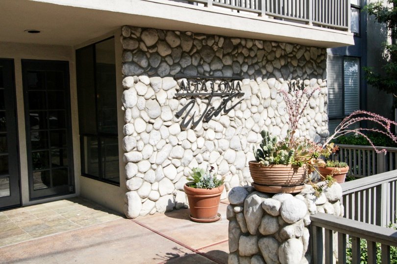 The name of the Alta Loma West written on the building