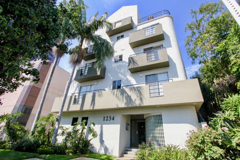 1234 Granville, west la, California is A beautiful sky high well construct building which have elegant colour and shiny bright glass windows. Lots of green trees enhance its beauty. A sunny bright day give it an amazing look.
