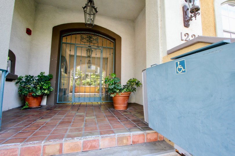 The entrance a door of a villa in Armacost Fountains